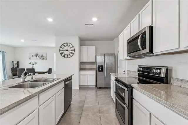 a bedroom with a bed and closet