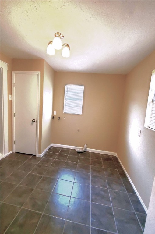 2806 Topeka Street Corpus Christi, TX 78404 - Photo 10 of 12 an empty room with white walls and tiles