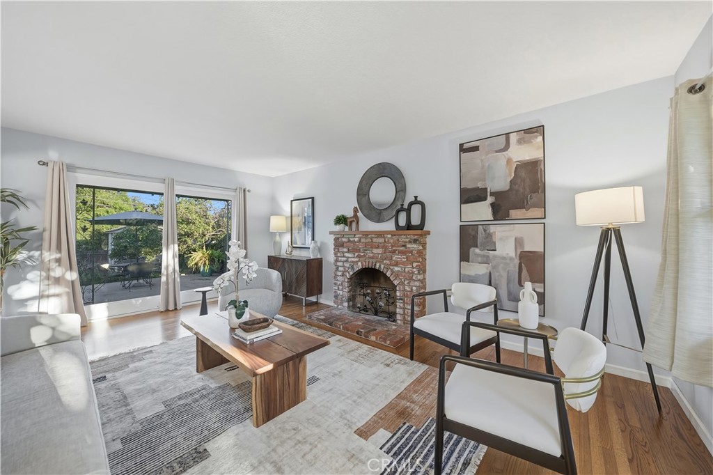 6754 North Provence Road San Gabriel, CA 91775 - Photo 2 of 14 living room w/ access to back patio through the glass sliding doors