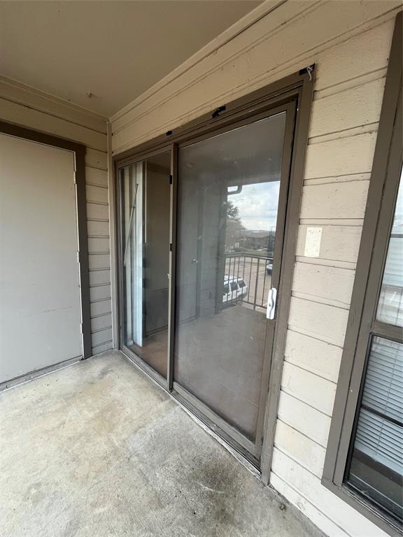 4460 Chaha Road, Unit 205 Garland, TX 75043 - Photo 27 of 27 a view of gallery with front door