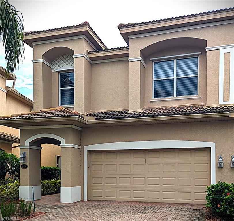 20176 Larino Loop Estero, FL 33928 - Photo 2 of 31 a front view of a house