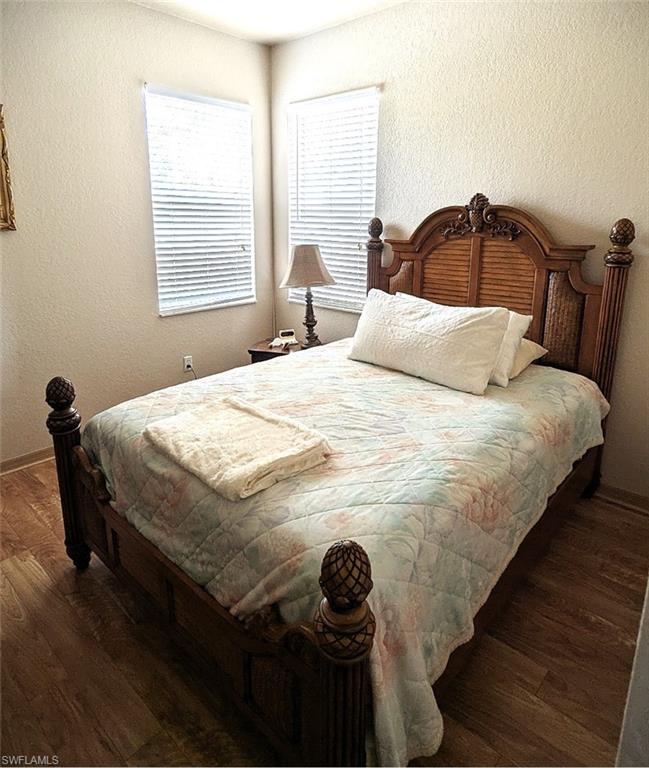 20176 Larino Loop Estero, FL 33928 - Photo 26 of 31 a bedroom with a bed and a window