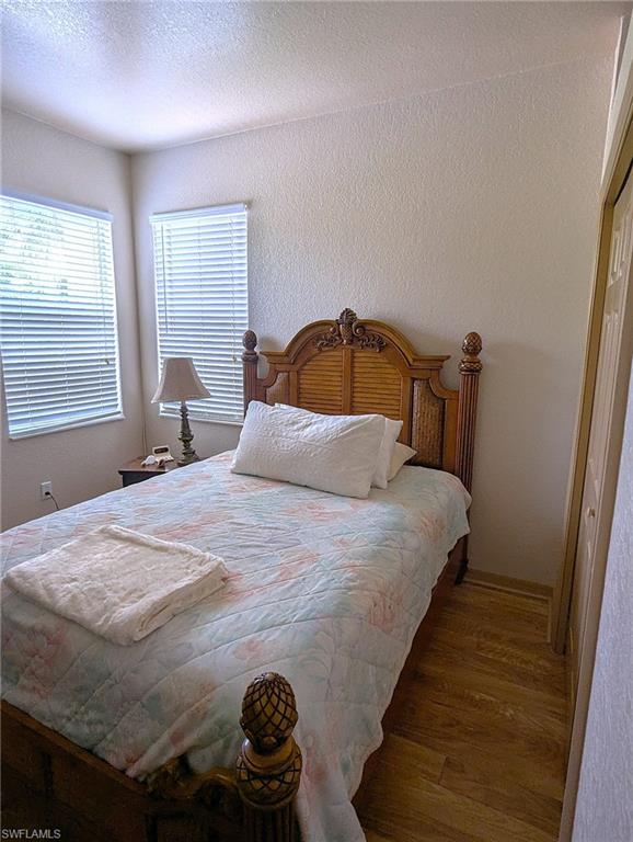 20176 Larino Loop Estero, FL 33928 - Photo 27 of 31 a bedroom with a bed and window