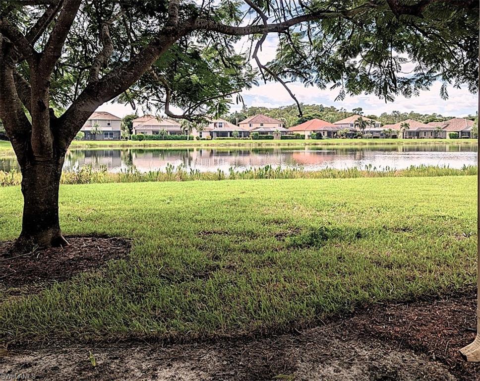 20176 Larino Loop Estero, FL 33928 - Photo 31 of 31 a view of a garden with trees