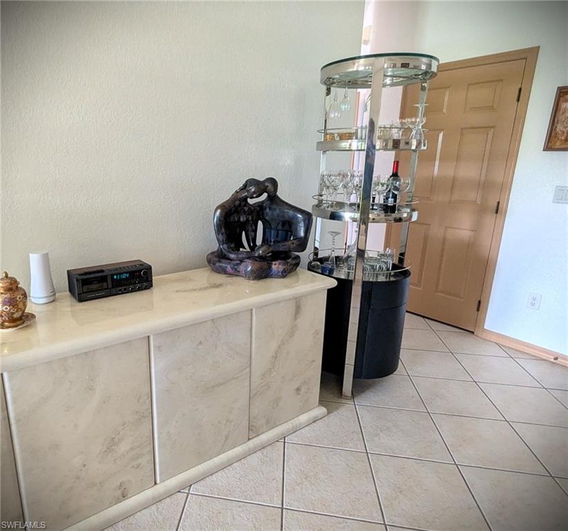 20176 Larino Loop Estero, FL 33928 - Photo 7 of 31 a room with storage and utility