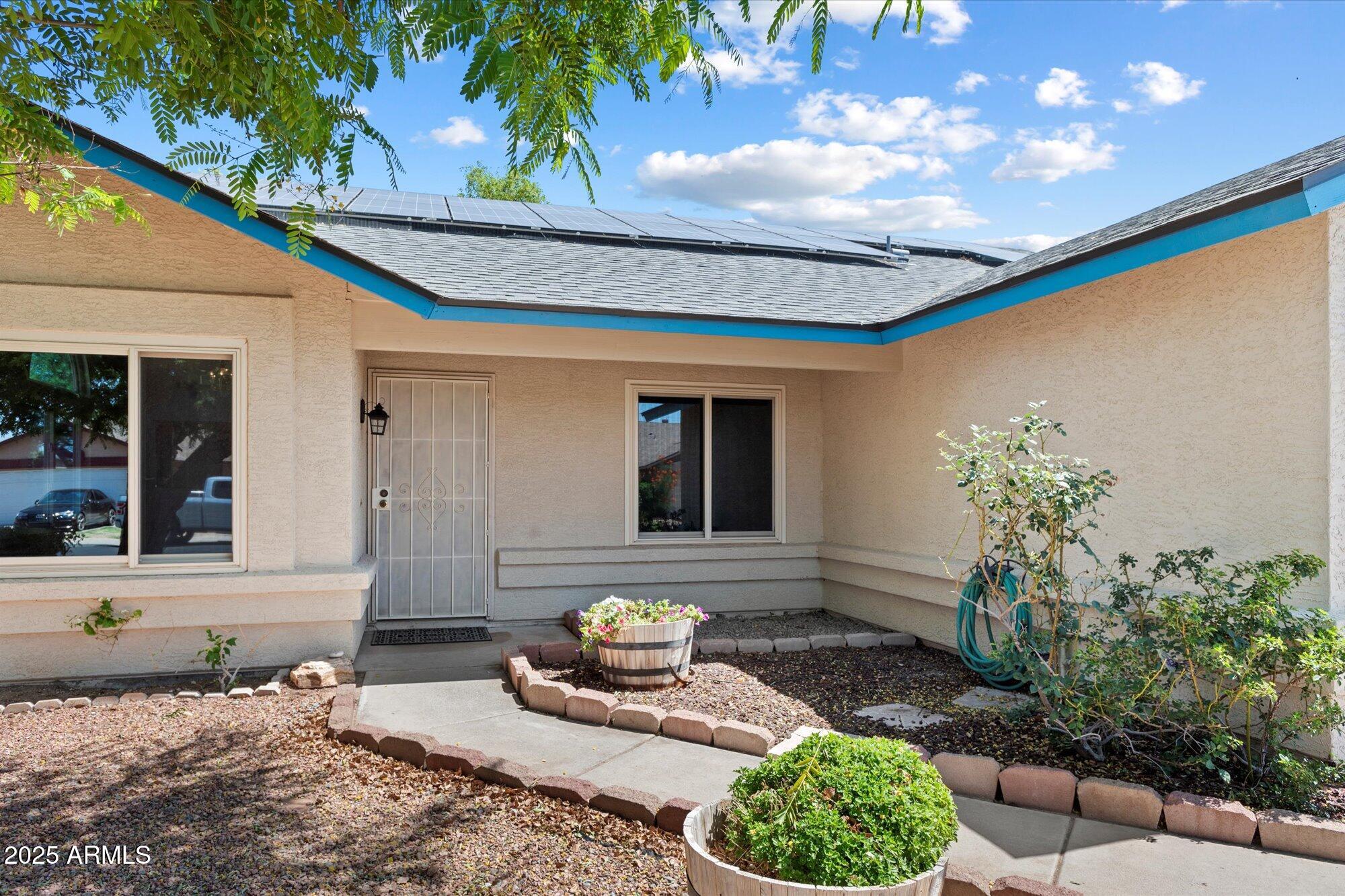 8540 West Ocotillo Road Glendale, AZ 85305 - Photo 3 of 22 a front view of a house