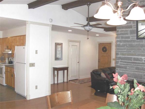 98 Southbridge Road Charlton, MA 01507 - Photo 12 of 30 a living room with furniture and a chandelier