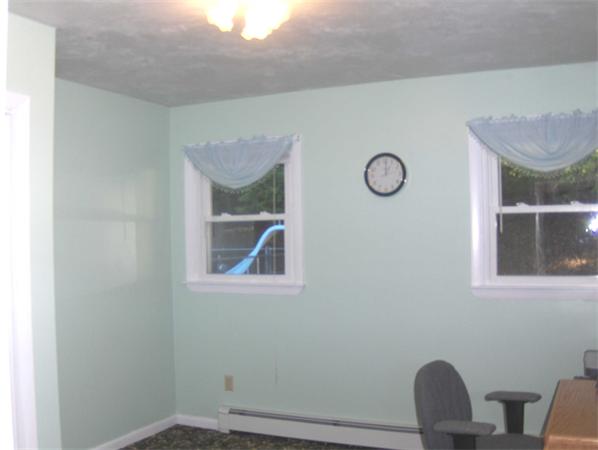 98 Southbridge Road Charlton, MA 01507 - Photo 19 of 30 a view of a room with wooden floor and windows