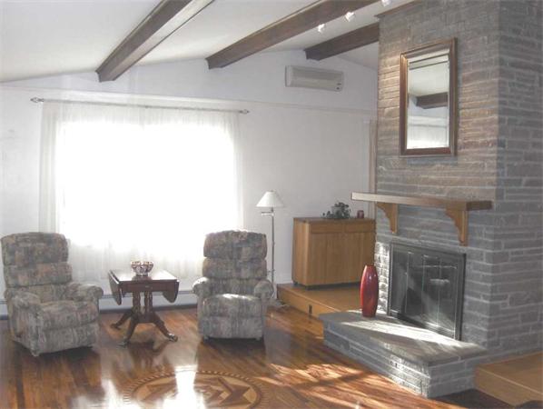 98 Southbridge Road Charlton, MA 01507 - Photo 6 of 30 a living room with furniture and a fireplace