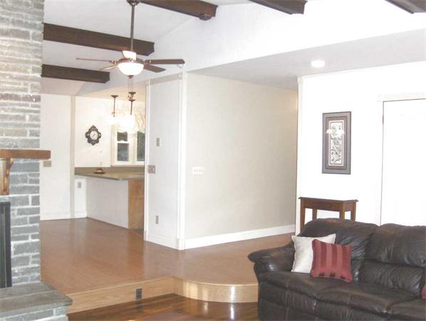 98 Southbridge Road Charlton, MA 01507 - Photo 8 of 30 a living room with furniture and a chandelier