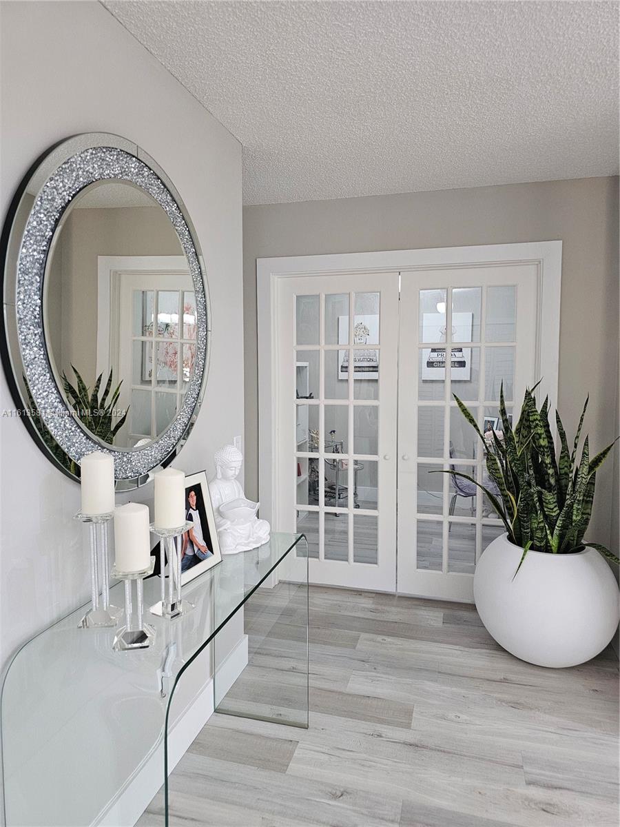 4323 Southwest 148th Place Miami, FL 33185 - Photo 23 of 70 a view of a livingroom with furniture and mirror