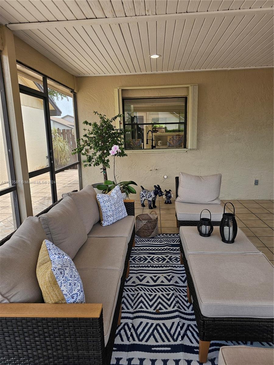 4323 Southwest 148th Place Miami, FL 33185 - Photo 47 of 70 a living room with furniture