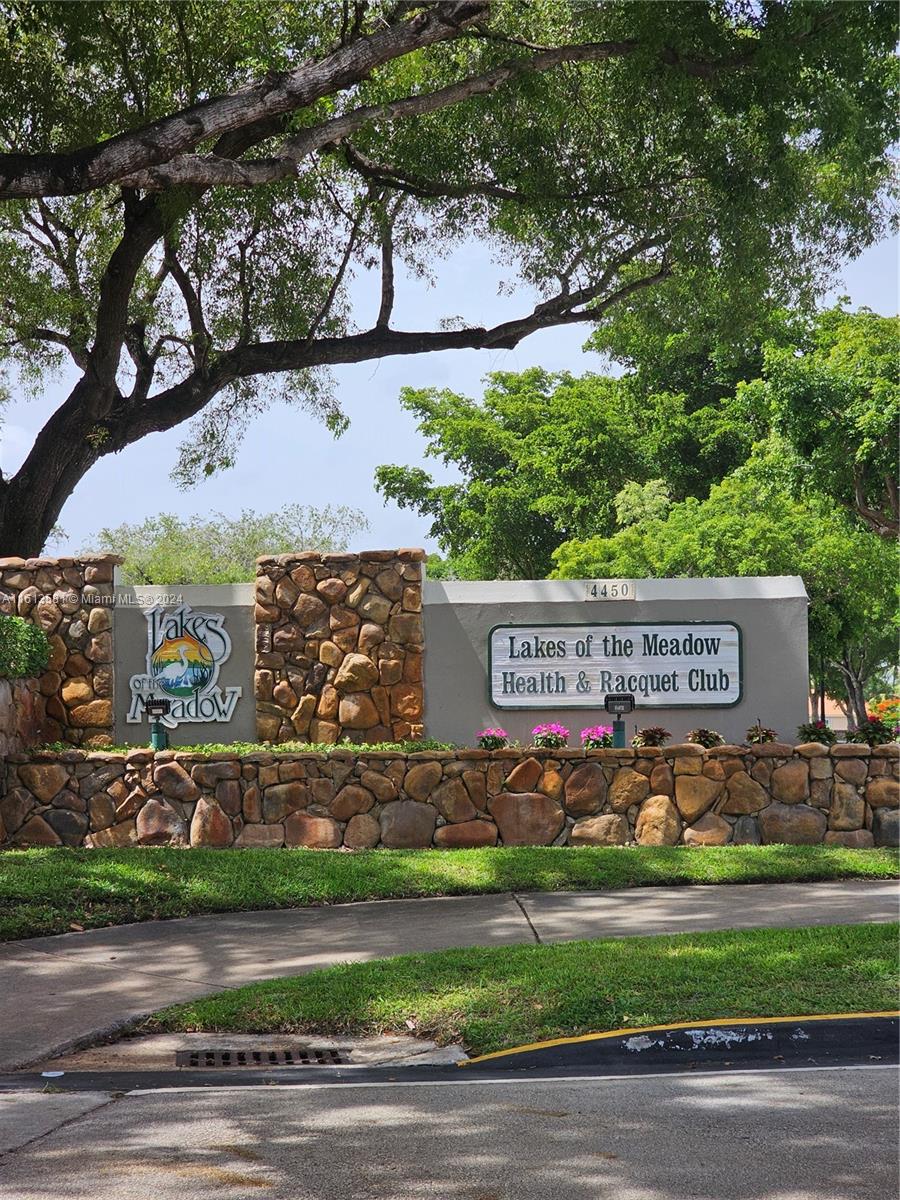 4323 Southwest 148th Place Miami, FL 33185 - Photo 50 of 70 a sign that is on the side of a road