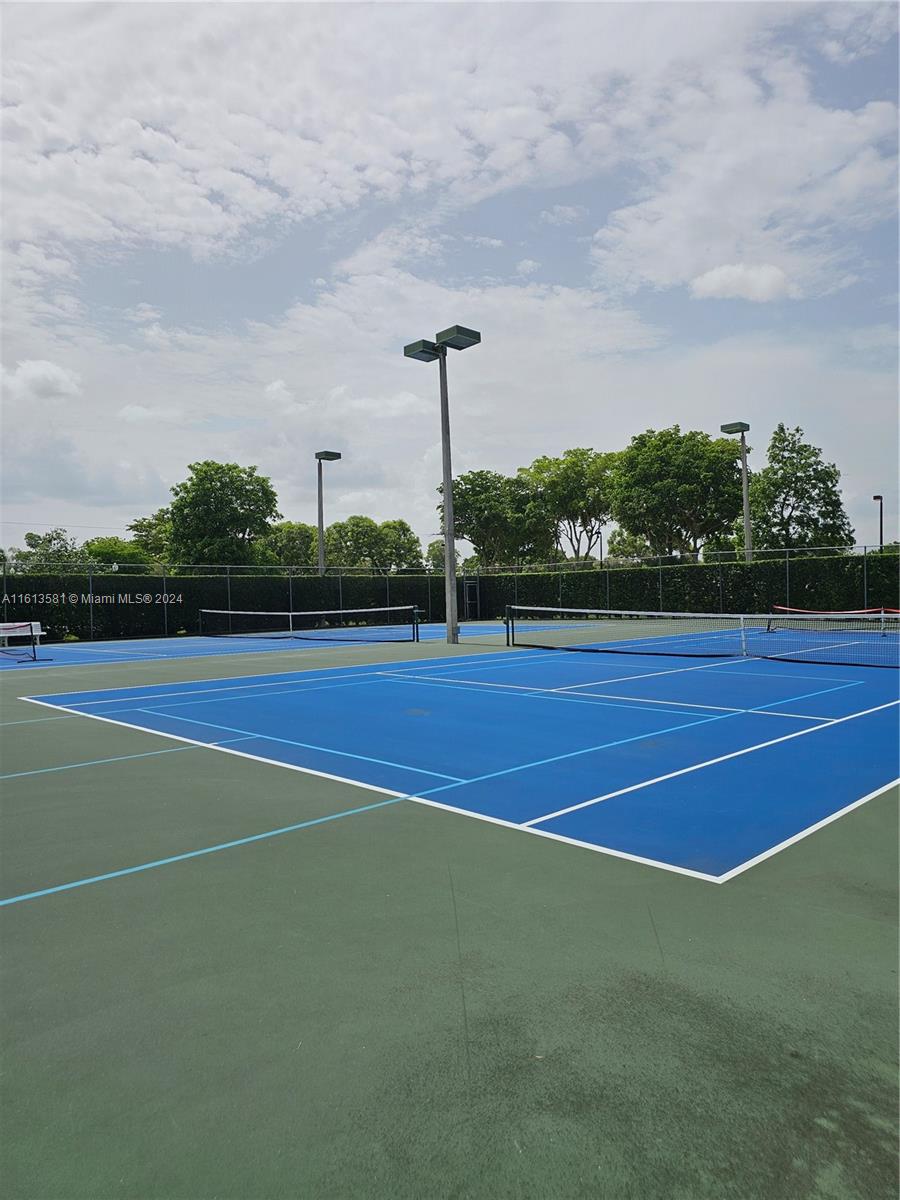4323 Southwest 148th Place Miami, FL 33185 - Photo 59 of 70 a view of a tennis court