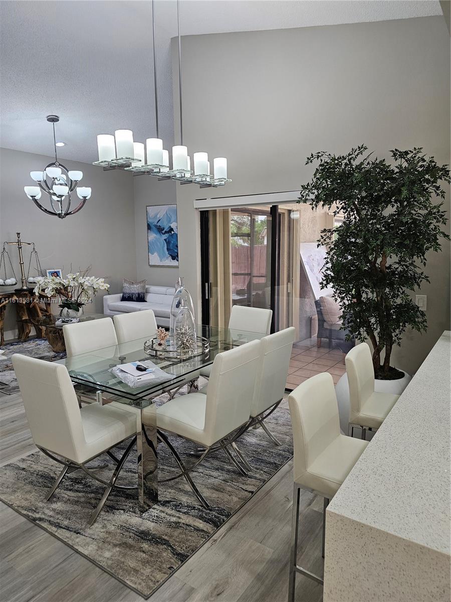 4323 Southwest 148th Place Miami, FL 33185 - Photo 10 of 70 a view of a dining room with furniture