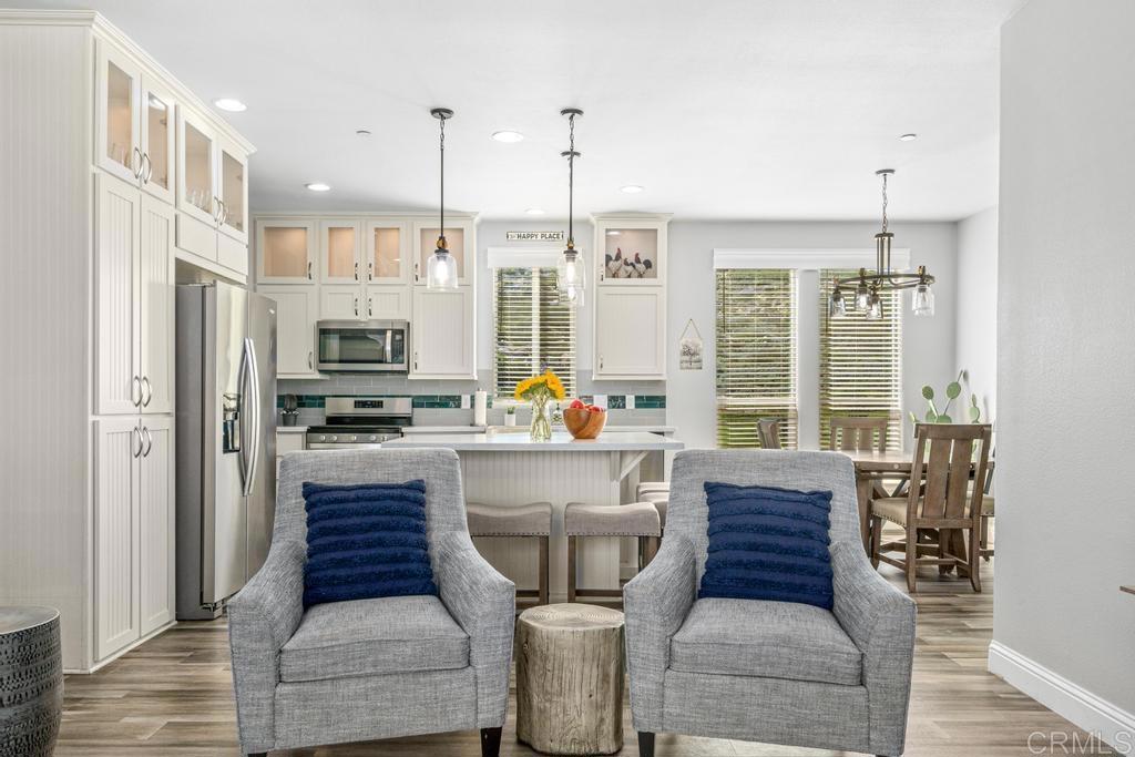 2815 Miller Valley Road Pine Valley, CA 91962 - Photo 13 of 45 a large white kitchen with stainless steel appliances