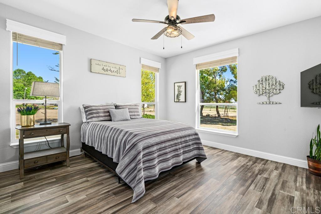 2815 Miller Valley Road Pine Valley, CA 91962 - Photo 18 of 45 a spacious bedroom with a bed and a window