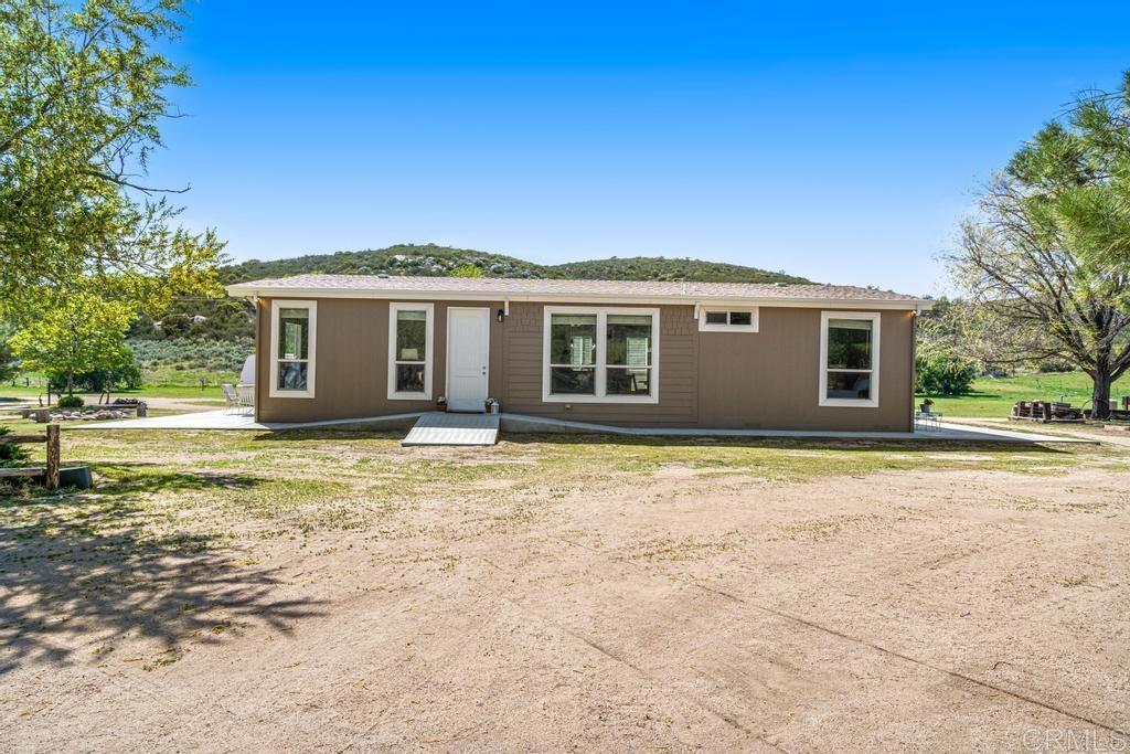 2815 Miller Valley Road Pine Valley, CA 91962 - Photo 10 of 45 a front view of a house with a garden