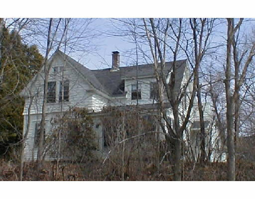 22 Townsend Road Groton, MA 01450 - Photo 1 of 1 a view of a house with a large tree