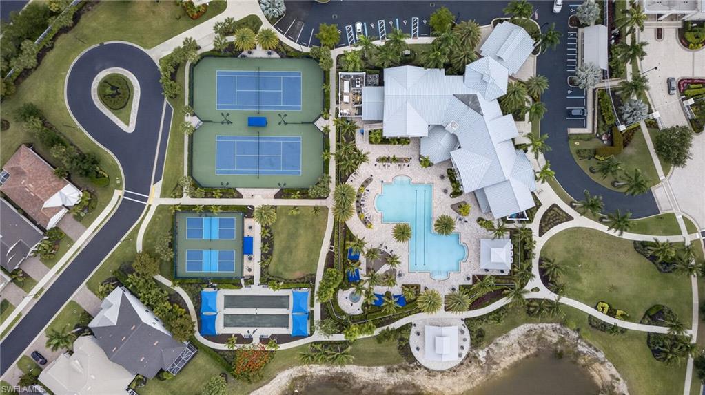 20105 Torch Key Way Estero, FL 33928 - Photo 28 of 29 an aerial view of residential house with outdoor space and parking