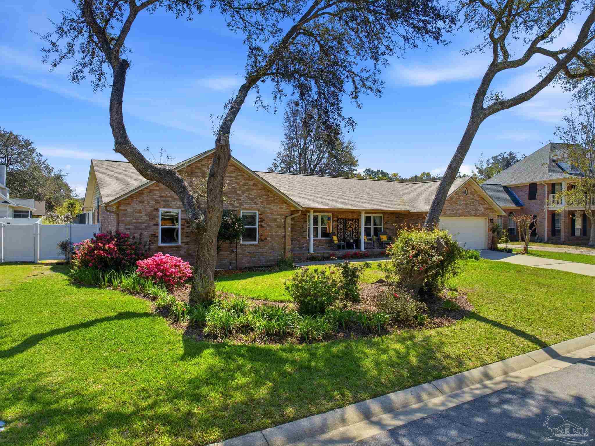 6550 Chardonnay Pensacola, FL 32504 - Photo 1 of 42 a front view of house with garden