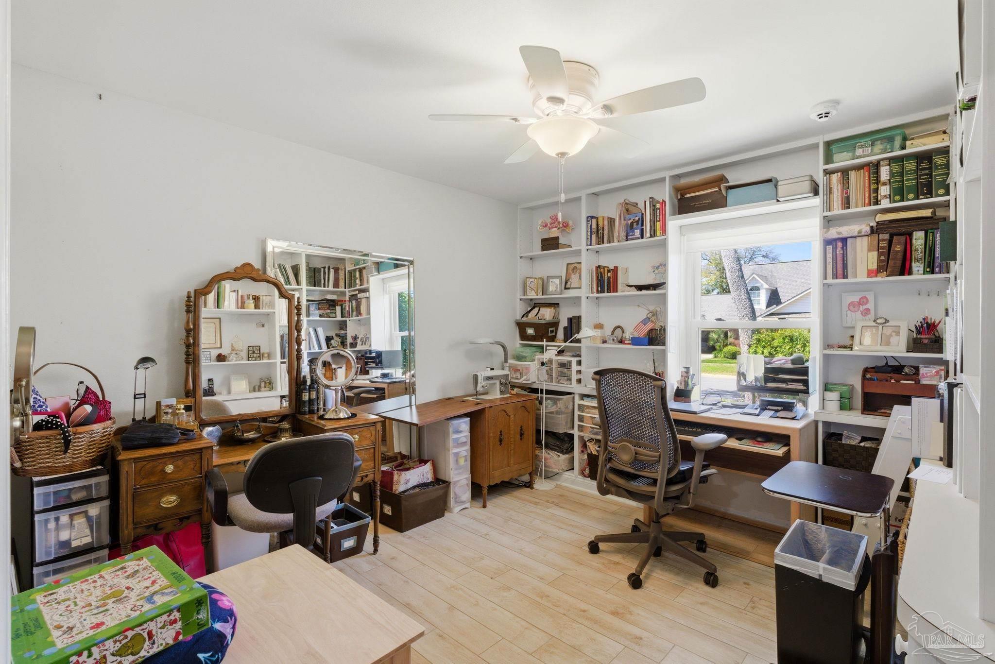 6550 Chardonnay Pensacola, FL 32504 - Photo 28 of 42 a view of a workspace with furniture and a window