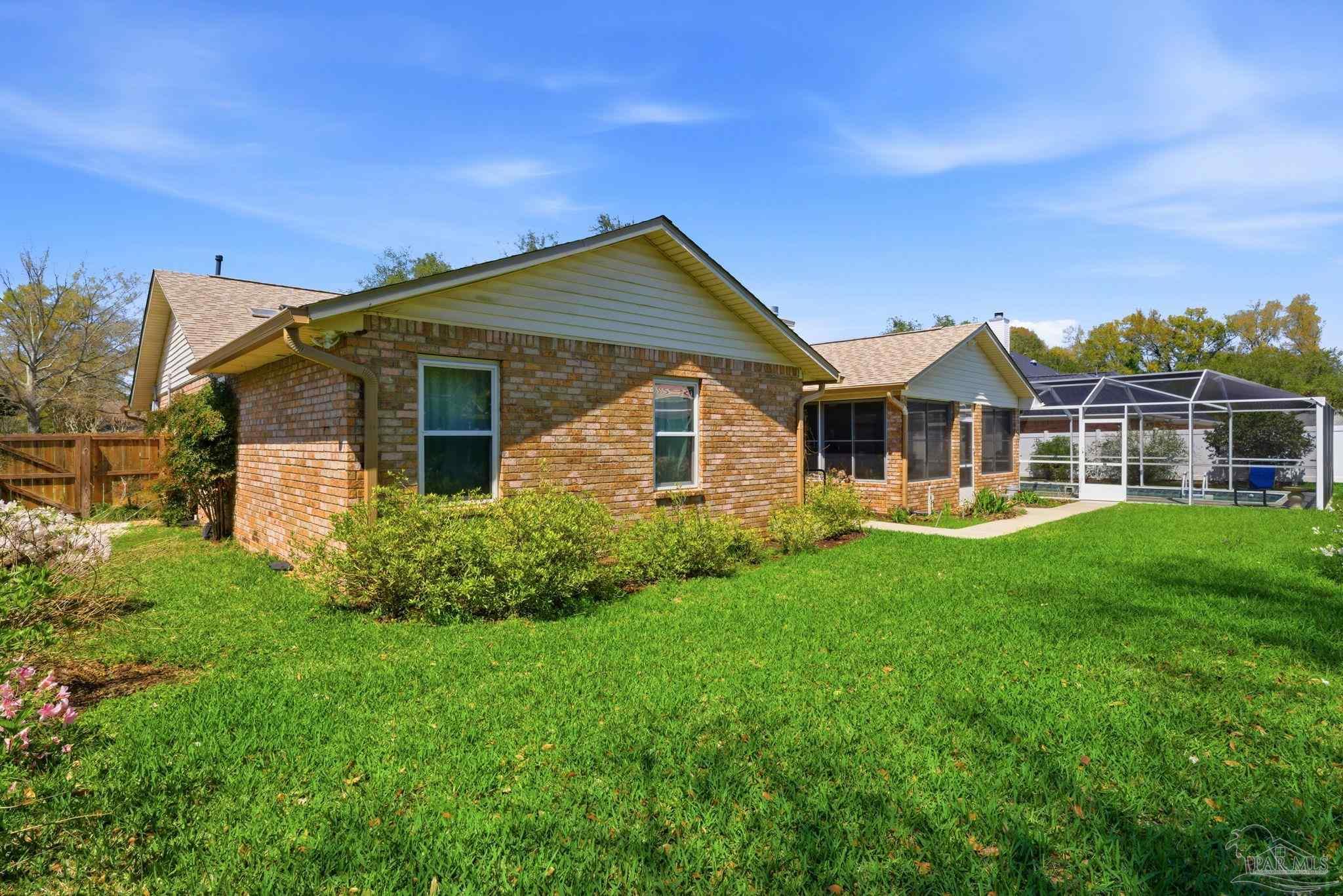 6550 Chardonnay Pensacola, FL 32504 - Photo 39 of 42 a front view of a house with yard