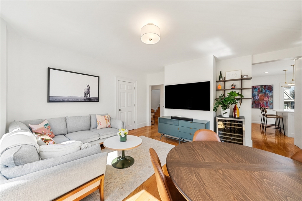 25 Fenwick Street, Unit 2 Somerville, MA 02145 - Photo 2 of 22 a living room with furniture and a flat screen tv