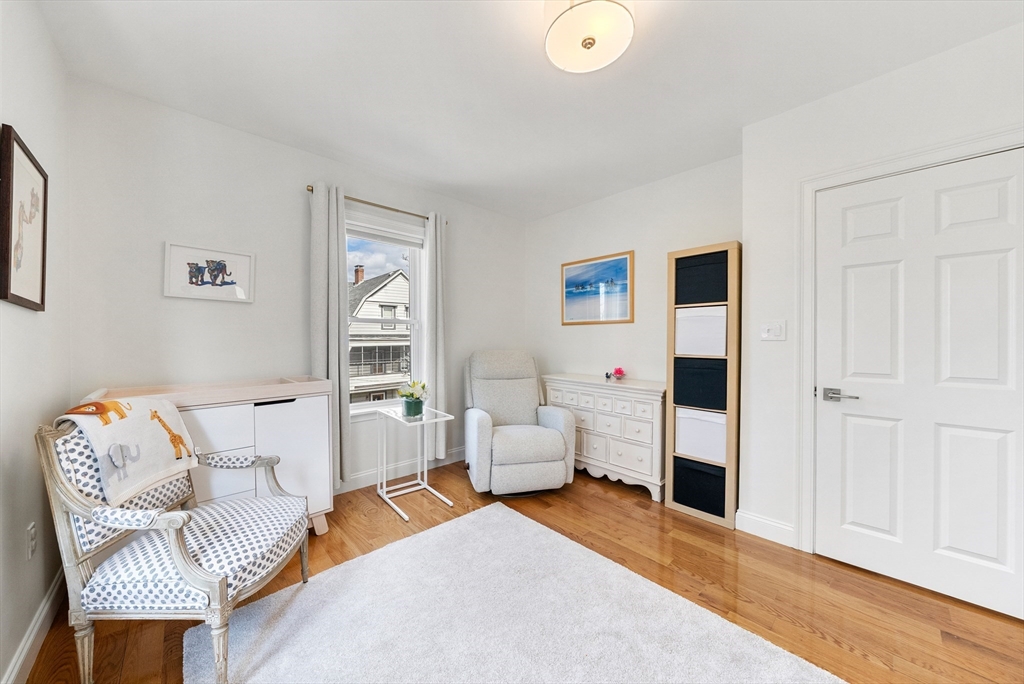 25 Fenwick Street, Unit 2 Somerville, MA 02145 - Photo 10 of 22 a living room with furniture and a couch