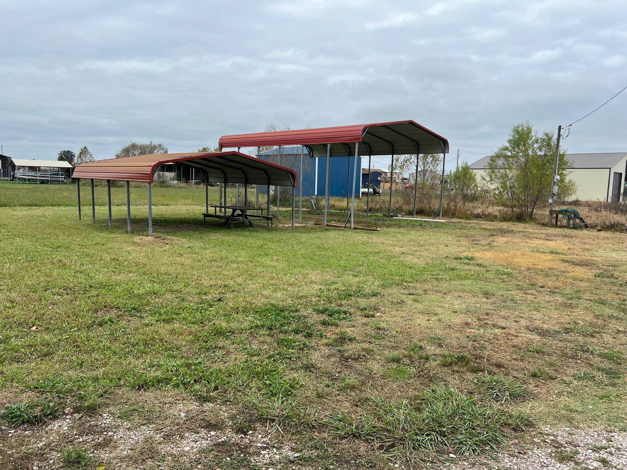 119 Cameron Old Ferry Road Adamsville, TN 38310 - Photo 1 of 3 View of yard featuring a carport
