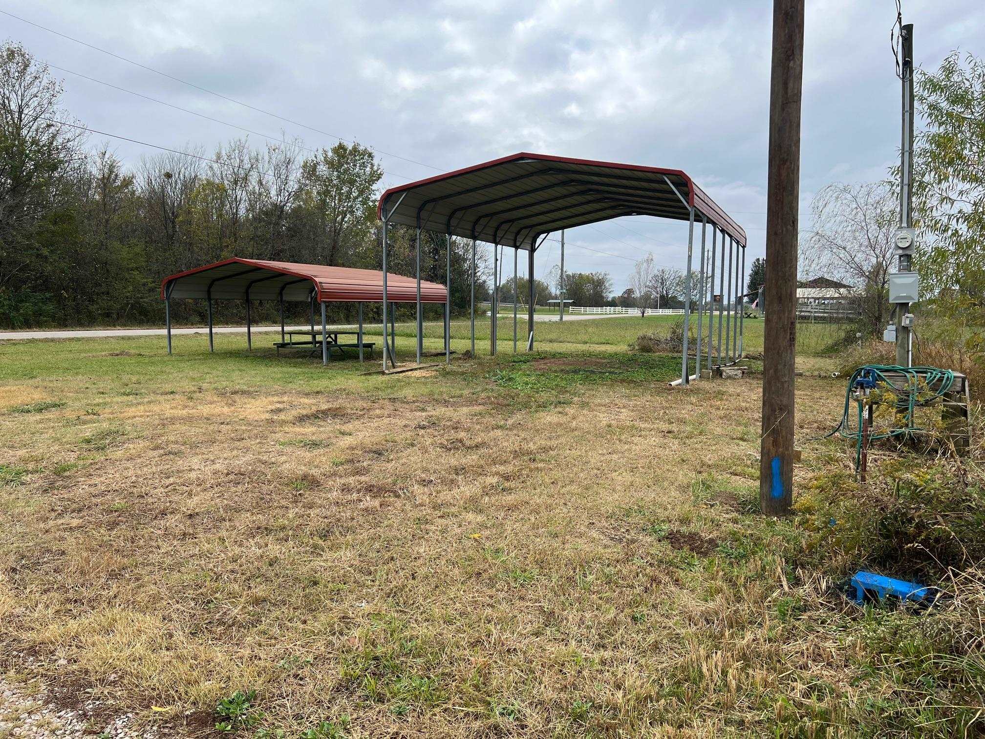 119 Cameron Old Ferry Road Adamsville, TN 38310 - Photo 2 of 3 View of yard with a carport