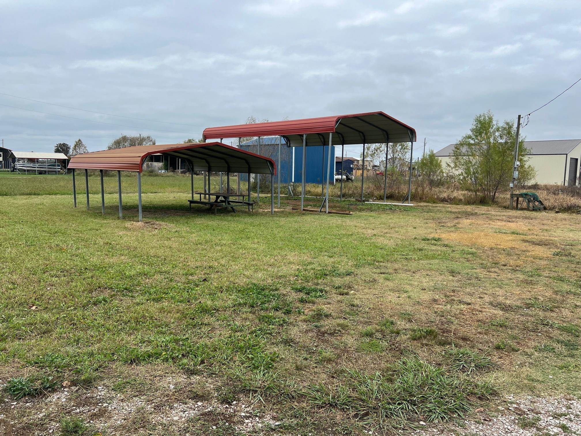 119 Cameron Old Ferry Road Adamsville, TN 38310 - Photo 3 of 3 View of yard with a carport