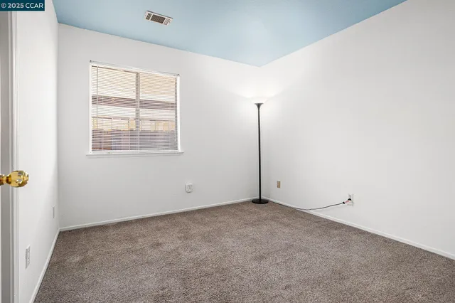 a house with trees in the background