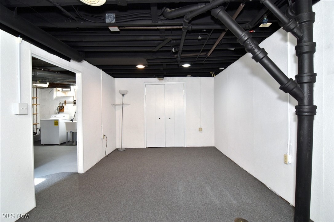 1575 Lander Road Cleveland, OH 44124 - Photo 34 of 49 Finished below grade area with washer / dryer and carpet