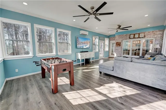 a bathroom with a double vanity sink a mirror and a bathtub
