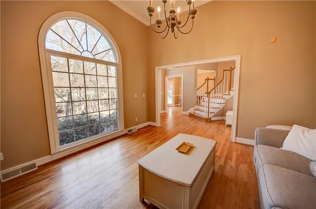 a living room with furniture and a window