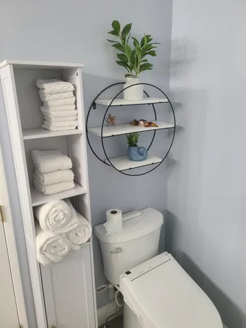 a kitchen with stainless steel appliances granite countertop wooden cabinets stove top oven and sink