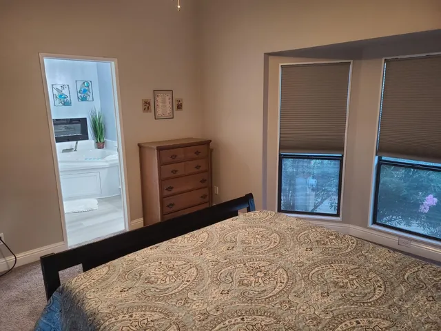 a view of storage and utility room with racks on the wall