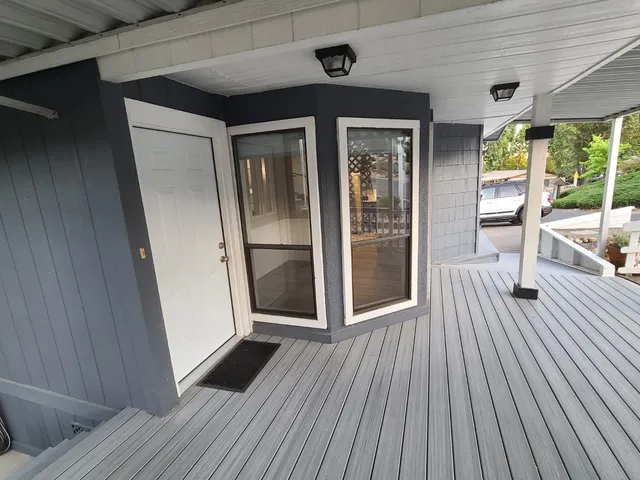 a view of a house with a street