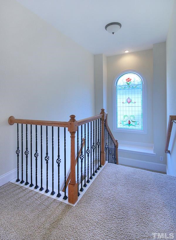 10008 Darling Street Raleigh, NC 27613 - Photo 15 of 24 a view of entryway with a window and a hallway