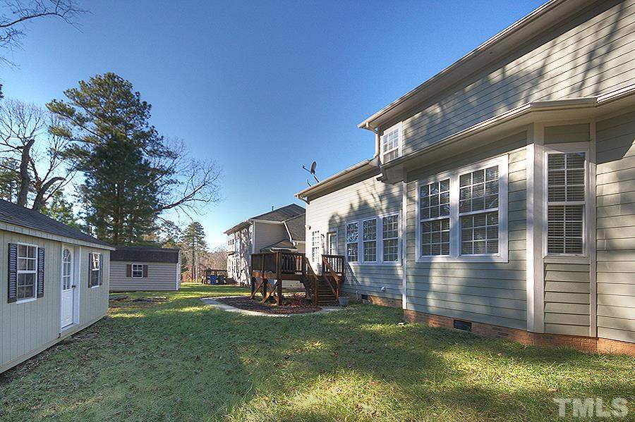 10008 Darling Street Raleigh, NC 27613 - Photo 24 of 24 a view of a house with backyard