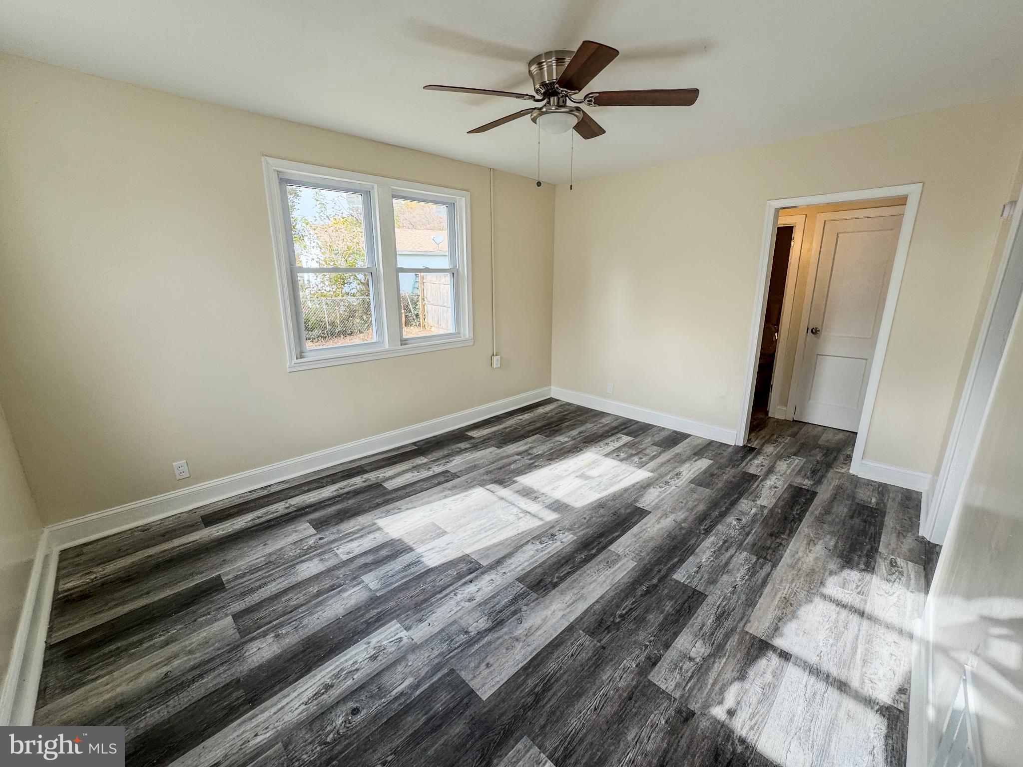703 Dover Court Wallingford, PA 19086 - Photo 3 of 13 a view of room with a ceiling fan