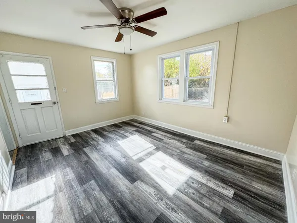 a view of an empty room and window