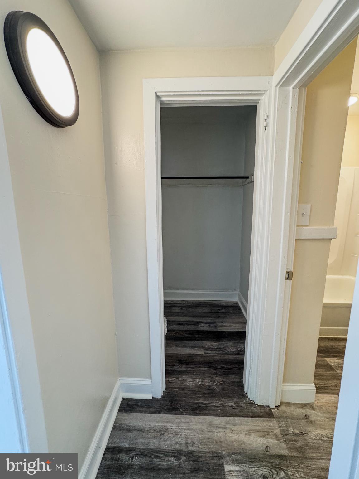 703 Dover Court Wallingford, PA 19086 - Photo 9 of 13 a view of entryway and hall with wooden floor