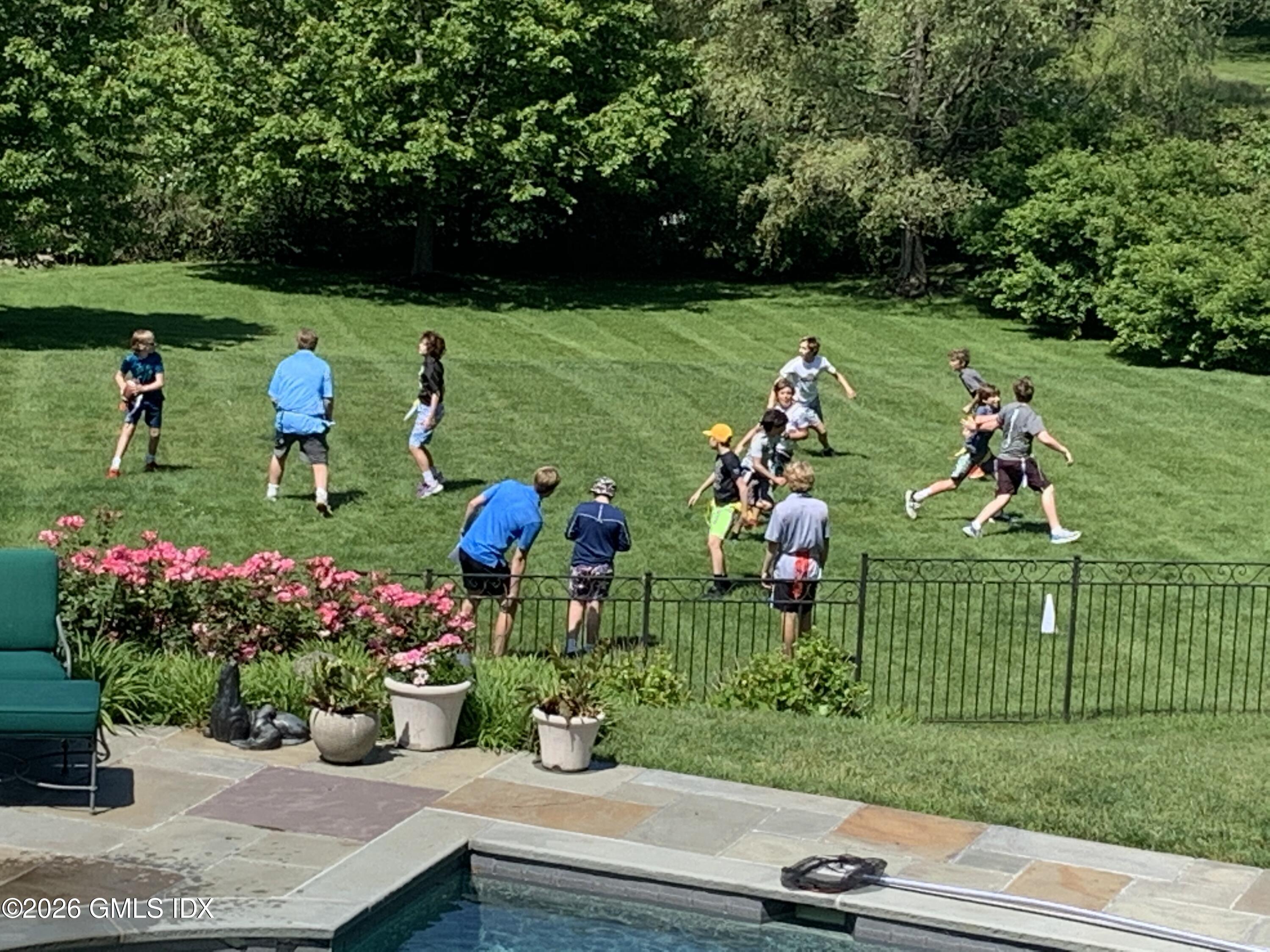 174 Round Hill Road Greenwich, CT 06831 - Photo 5 of 34 Enjoying The Backyard