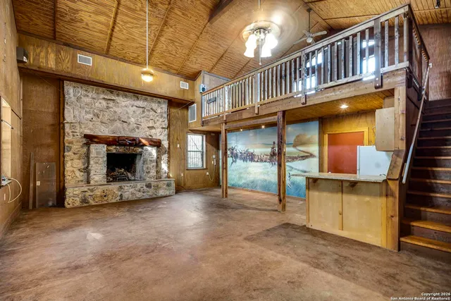 a living room with a fireplace