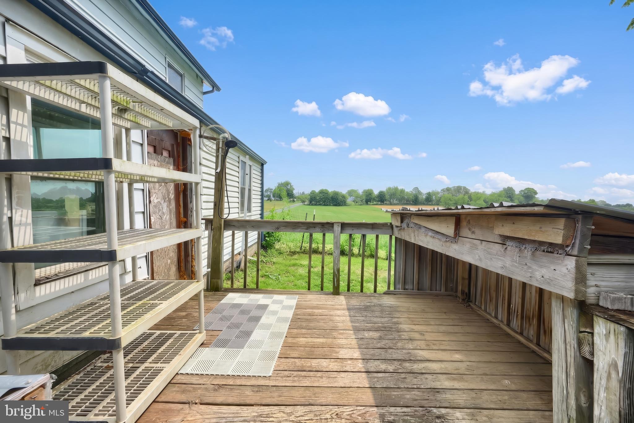1111 Richmond Road Red Lion, PA 17356 - Photo 47 of 57 a view of a balcony with wooden floor and fence