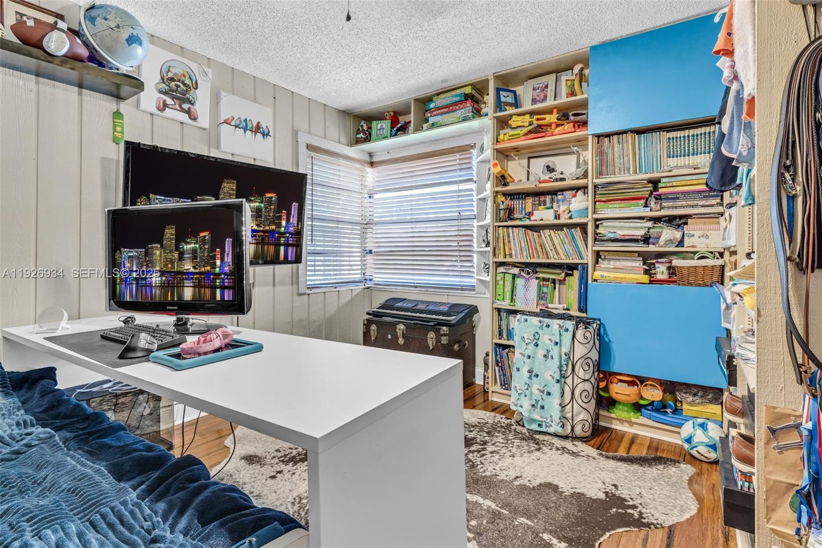 1420 West Sandpiper Circle, Unit 1420 Pembroke Pines, FL 33026 - Photo 22 of 38 a view of a workspace with furniture and toys