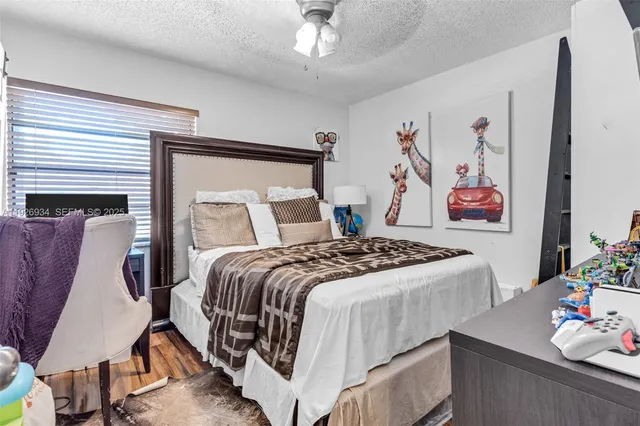 a bedroom with a bed and a walk in closet