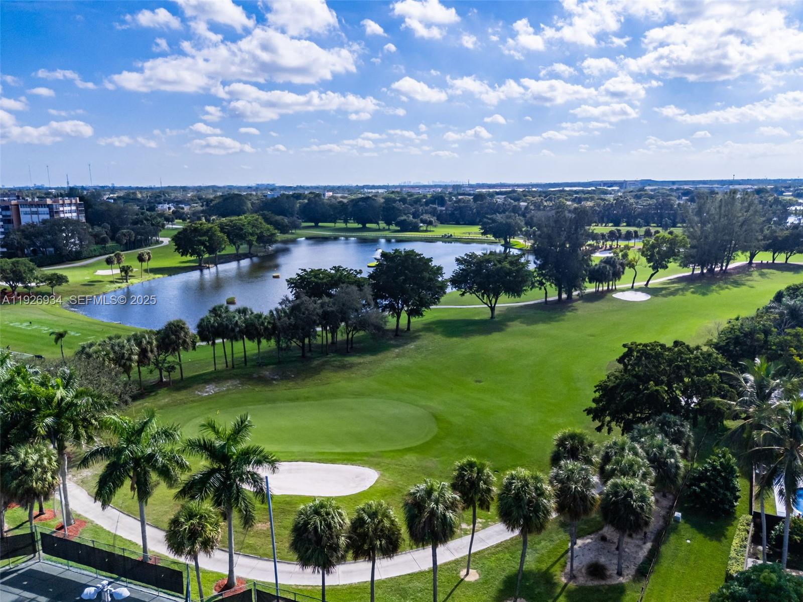 1420 West Sandpiper Circle, Unit 1420 Pembroke Pines, FL 33026 - Photo 38 of 38 a view of a lake with a city